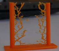 Is the print surface covered with web-like strings?