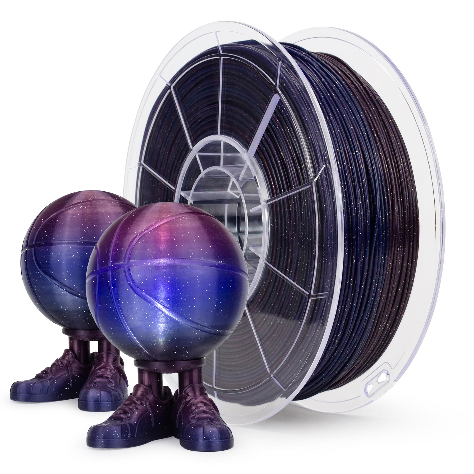 Spool of purple filament with two purple balls on a white background