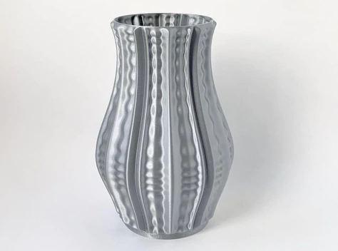 3d printed vase in silver silk filament
